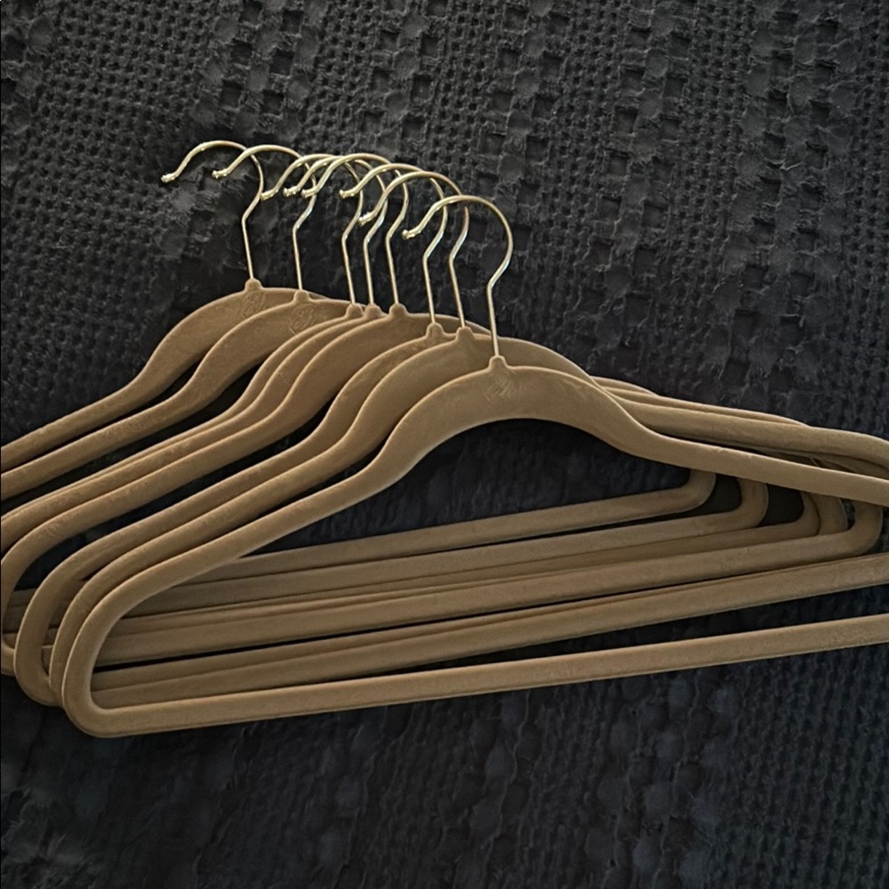 Authentic Joy Mangano hangers with stamped logo. Medium gray w/silver tone hook.